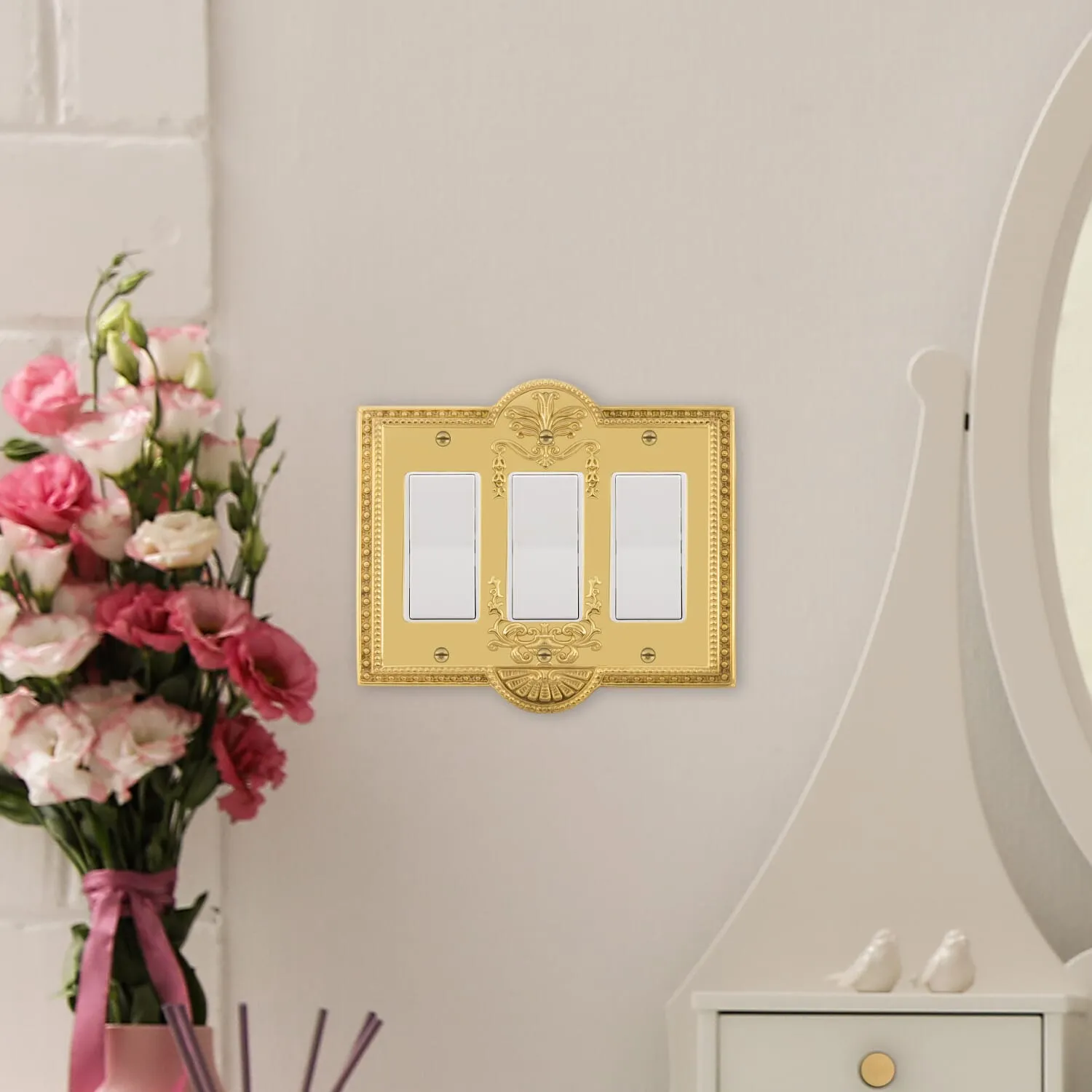 Meadows Switch Plate with Triple Rocker in Polished Brass